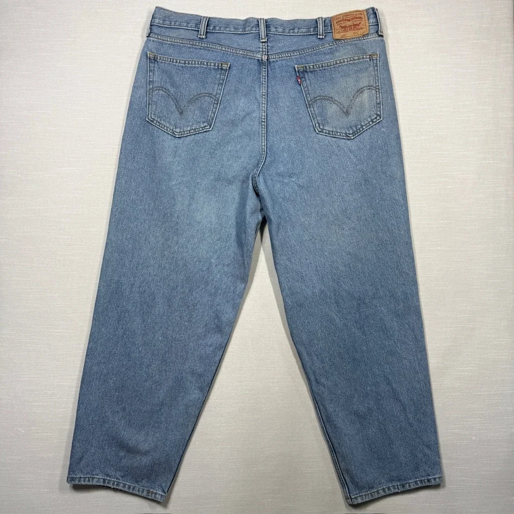 Levi's 560 Comfort Fit Jeans Mens 42x30 Blue Denim Light Wash Distressed Stained